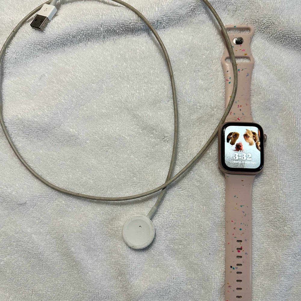 Apple Watch with Pink Speckled Band and Charger